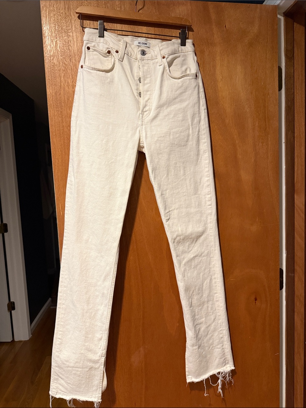 Re/Done Cream Straight Leg Jeans with Raw Hem. Inside leg slit.